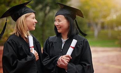 Image showing Graduation, girl friends and study certificate of students with happy communication outdoor. Female student and campus graduate with happiness and college achievement with diversity for degree