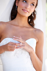 Image showing Bride, wedding ring and marriage with a woman standing outdoor ready to get married during a ceremony of love. Event, jewellery or diamond with an attractive young person in celebration of commitment