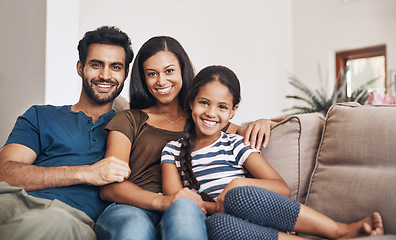 Image showing Happy family, smile and portrait on the sofa to relax, bond and sitting comfortable. Content, quality time and a mother, father and girl child on the living room couch for happiness, love and care