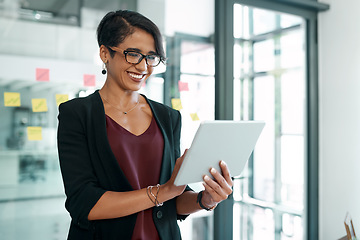 Image showing Woman, business and typing on tablet for email, internet research or browsing for ideas, planning or communication. Female expert, corporate or scrolling, reading or working on social network