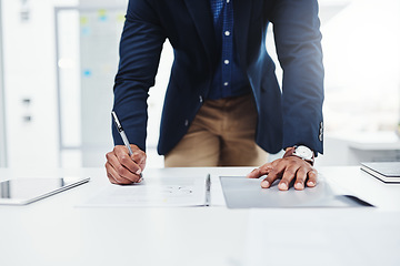 Image showing Workplace, professional and writing man with paperwork at a desk with a tablet for website on app. Entrepreneur, businessman and working on documents with expert for analysis and planning in company.