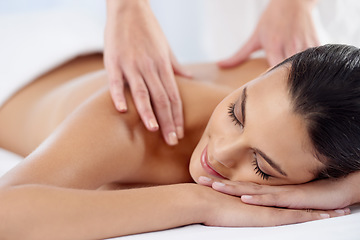 Image showing Happy, luxury and woman with massage, self care and stress relief with salon treatment, grooming and wellness. Female person, client and lady with skincare, relax and health with peace at a resort