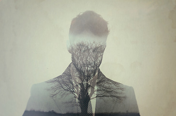 Image showing Business man, double exposure and trees with suit, silhouette and sad for danger in environment. Sustainability, ecology and forrest with businessman, thinking and ideas with holographic overlay