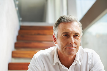 Image showing Thinking, steps and man in retirement at home with memories and sitting. Memory, relax and mature male person in a household alone with ideas and day dreaming about future and past in a house