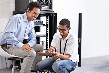 Image showing Server room, it support and clipboard with a technician talking to a business man about cyber security. Network, database and contract with a male engineer chatting about information technology