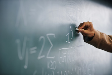 Image showing Closeup, hand and writing on a blackboard, formula and teaching with system, process and geek. Zoom, person and teacher with chalk, learning and maths equation with calculation, research or education