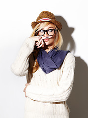 Image showing Hipster, isolated portrait and girl with moustache on index finger, nerd glasses and fun pose on studio white background. Young woman, modern fashion and mustache joke or goofy, weird and finger