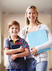 Image showing Portrait, teacher and boy walking, hallway and books with education, knowledge and happiness. Face, female person and student with an educator, male child and kid in a lobby, corridor and learning