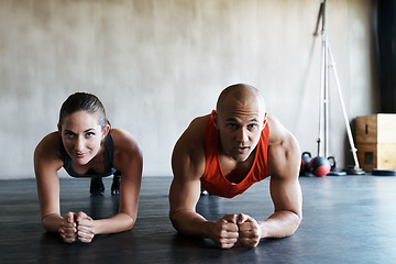 Image showing Gym floor, portrait and people doing plank challenge, fitness club commitment or core strength building. Balance, teamwork and athlete man, woman or partnership team concentrate on muscle workout