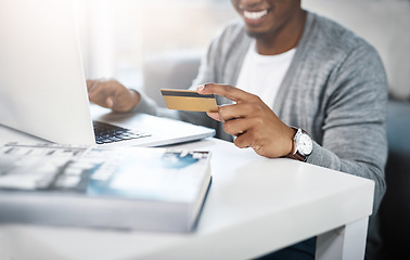 Image showing Laptop, credit card and man for home online shopping, e learning and fintech payment, loan or happy finance. Student or person hands and on floor typing banking information and computer transaction