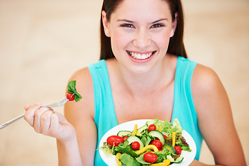Image showing Woman, portrait and eating a healthy salad with vegetables, nutrition and health benefits. Face of a happy female person on a nutritionist diet with vegan food for weight loss, wellness or detox