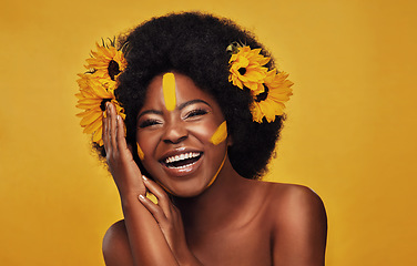 Image showing Portrait, smile and black woman with sunflowers in her hair, makeup and confident girl against a studio background. Face, female person and model with cosmetics, funny and natural care with happiness