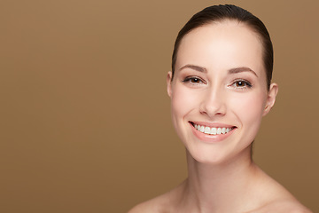 Image showing Portrait, mockup and woman with beauty, skincare and confident against a brown studio background. Face, female person and model with a smile, cosmetics and salon treatment with luxury and grooming