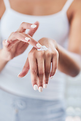 Image showing Hands, skincare cream and woman moisturizing in home for healthy skin, beauty and hydration. Dermatology, hand and female model with creme product, lotion cosmetics or moisturizer oil with manicure.