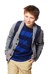 Image showing Happy boy, school and portrait smile standing with hands in his pockets, cool or style isolated on a white background. Young little child or kid student posing with backpack for learning or education