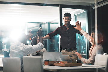 Image showing High five, celebration and business team in partnership in the office for project success. Meeting, diversity and corporate employee friends with achievement to celebrate together in modern workplace