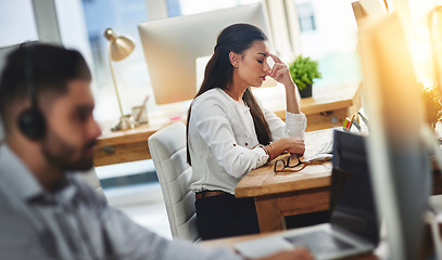 Image showing Burnout, headache or woman in call center office with depression or mental health problems at help desk. Emergency, stress or depressed sales consultant in telecom company frustrated by migraine pain