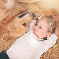 Image showing Top view, dog and girl with happiness, bonding and protection with joy, growth and loving together. Happy female child, pet and kid with a smile, relax and chilling with animal, puppy and development