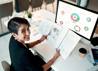 Image showing Portrait, woman and computer screen for data analytics, documents and planning ecommerce or fashion business. Happy face of creative designer or person, paperwork and analysis, charts or graphs above