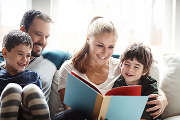 Image showing Family, reading book together with parents and children, happiness at home with story time and learning. Love, relationship and happy people bonding in living room, education and mom, dad with kids