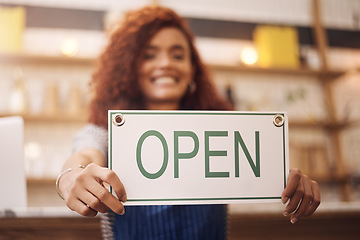 Image showing Open sign, hands and woman in shop, store and advertising notice of retail shopping time, board or trading information. Closeup, small business owner and opening banner for welcome, start or services