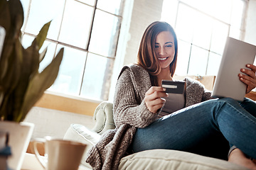 Image showing Smile, tablet and credit card, happy woman on couch in living room and internet banking or fintech in home. Technology, online shopping payment and girl on sofa surfing retail website or digital shop