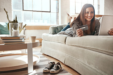 Image showing Relax, mobile app and credit card, happy woman on couch with tablet and internet banking in home. Ecommerce technology, online shopping payment and girl on sofa surfing retail website or digital shop