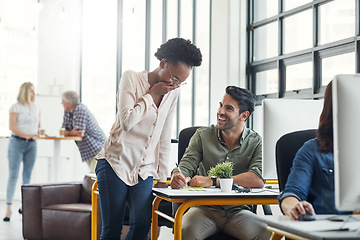 Image showing Laughing, man and woman in coworking space with joke, smile and happiness at creative start up agency. Computer, desk and happy team leader in funny conversation with designer in office with comedy.