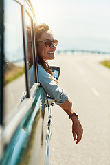 Image showing Road trip, travel and woman in window of car for adventure, summer vacation and holiday. Transport, relax and face of excited female person in motor vehicle for freedom, journey and happy outdoors