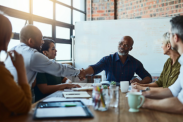 Image showing Business people, meeting and handshake with ceo for deal, partnership or senior collaboration. Smile, shaking hands or black men with agreement, congratulations or b2b, group negotiation or thank you