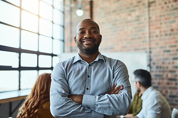 Image showing Portrait, startup and black man with arms crossed, leader or success with teamwork. Face, male person or entrepreneur with confidence, leadership or meeting with a career, happiness and modern office