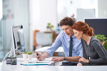 Image showing Business, man and woman with documents, talking and collaboration at the office, partnership and conversation. Staff, female employee and male consultant with paperwork, discussion and brainstorming