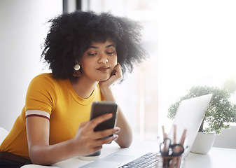 Image showing Phone, laptop and bored business woman on social media, browse or texting while working on report or email. Phone, search and female office worker online waiting for text, message or notification