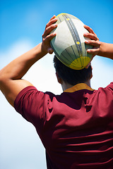 Image showing Back, rugby and man with a ball, game and fitness with exercise, playing and workout. Professional player, guy and athlete with training, practice for a match and sports with confidence and wellness