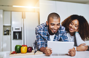 Image showing Couple, tablet and cooking with recipe in kitchen at home for food blog, internet website and online connection. Happy man, woman and digital technology for reading healthy vegan meal instructions
