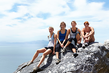 Image showing Happy, friends and portrait of women on mountain cliff for rock climbing, freedom and travel vacation. Sports, hiking and adventure with people on rock in nature for trekking, training and mockup