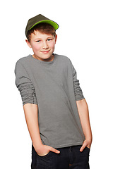 Image showing Cool, stylish and portrait of a child with fashion isolated on a white background in a studio. Smile, trendy and a young boy as a fashionable model looking confident, happy and cute in clothing