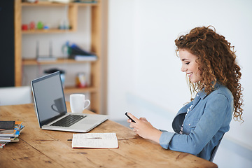 Image showing Happy woman, business student and texting on smartphone in creative startup, designer agency or desk. Young office intern typing on cellphone, online app or reading notification on mobile technology