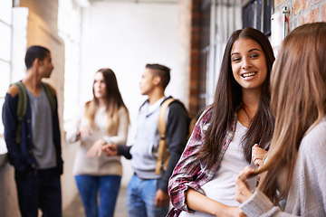 Image showing Girl friends, university and hallway people talking with happiness, bonding or discussion together. Teenager, college or school communication of young gen z students on campus for education and class