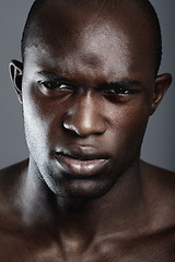 Image showing Portrait , serious and black man with skincare, cosmetics and dermatology against a grey studio background. Face, male person and model with beauty, salon treatment and luxury with grooming routine