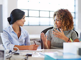 Image showing Collaboration, meeting and planning with business women in the office, talking about company strategy. Teamwork, partnership and communication with a female employee chatting to a colleague at work