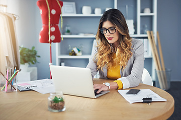 Image showing Fashion, laptop and business owner or designer focus on typing proposal and planning sales strategy on the internet. Ecommerce, retail and working startup entrepreneur of a boutique in a office