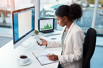 Image showing Business woman with phone, notebook and schedule at desk with calendar app and daily agenda at corporate agency. Professional female person writing in diary, check mobile and planning tasks in office