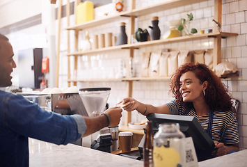 Image showing Credit card, coffee shop and happy woman with customer for payment, financial transaction and point of sales service. Finance, trade and bills at cashier in cafe, b2c shopping and restaurant store
