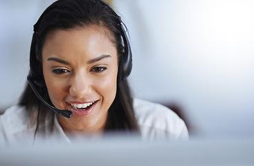 Image showing Talking, face or happy woman in call center consulting or speaking at customer services help desk. Virtual assistant, friendly girl or sales consultant in telemarketing or telecom company office