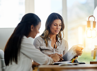 Image showing Business women, file and talking for partnership, planning and paperwork in office together. Woman, teamwork and focus with documents, notes or schedule at job for collaboration, consulting or advice