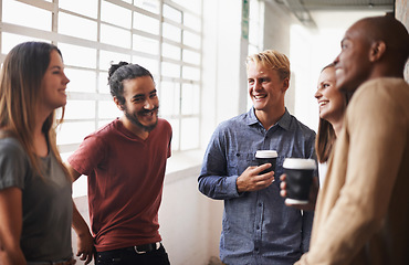 Image showing Talking, group and friends in a hallway, students and conversation with happiness, bonding and joyful. Diversity, young people and men with women, communication and discussion in a lobby with a smile
