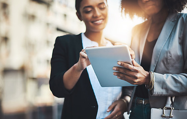 Image showing Business people, hands and tablet in city for social media, communication or team collaboration. Hand of woman employee in teamwork working on technology for online research or networking in town