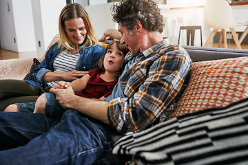 Image showing Mother, Father and kid talking on sofa in living room for love, quality time and relax together at home. Young boy, child and conversation with parents in lounge for support, happy family and care