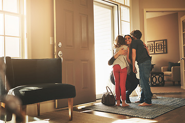 Image showing Home, love and a mother hugging her kids after arriving through the front door after work during the day. Greeting, family or children with a woman holding her son and daughter in the living room